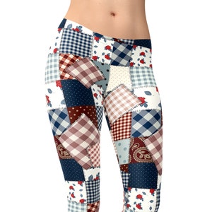 May include: A pair of leggings with a patchwork design featuring blue, red and white squares and floral accents.