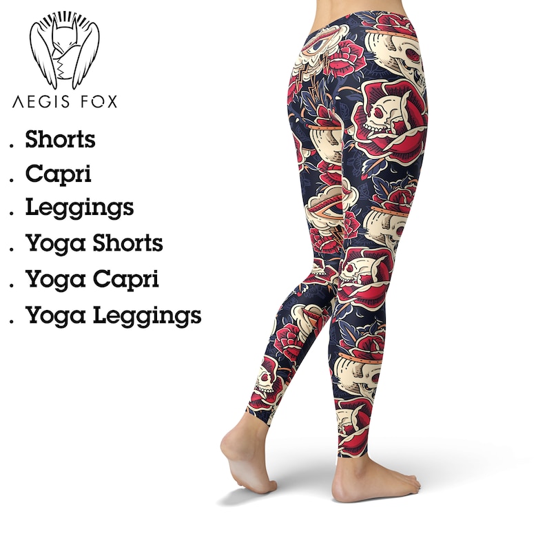 May include: A pair of black yoga leggings with a colorful print featuring skulls, roses, and eyes. The print is a vintage tattoo style.