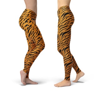 May include: A pair of leggings with a tiger stripe pattern in orange and black.