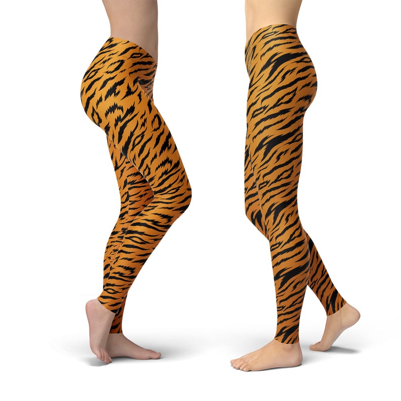 May include: A pair of leggings with a tiger stripe pattern in orange and black.