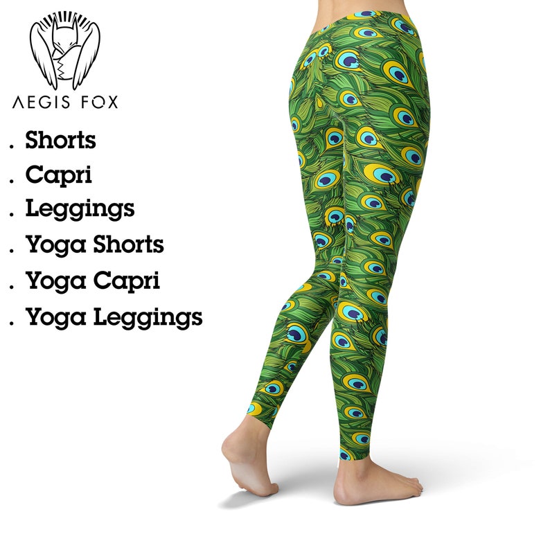 May include: Green leggings with a peacock feather pattern. The leggings are full length and have a bright green, blue, and yellow color scheme.