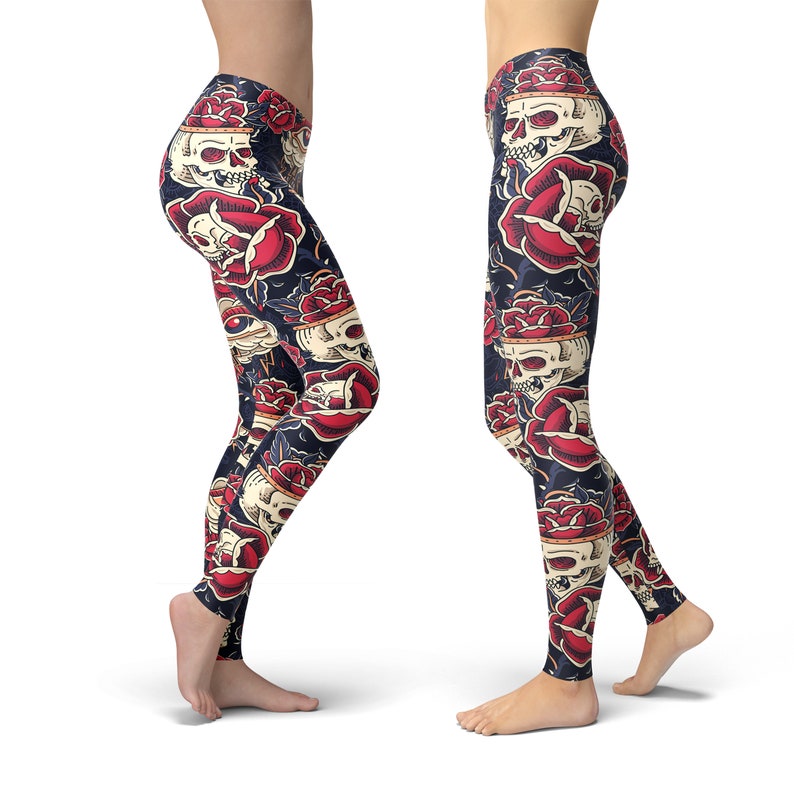 May include: Black leggings with a repeating pattern of red roses and white skulls. The skulls are wearing crowns of roses.