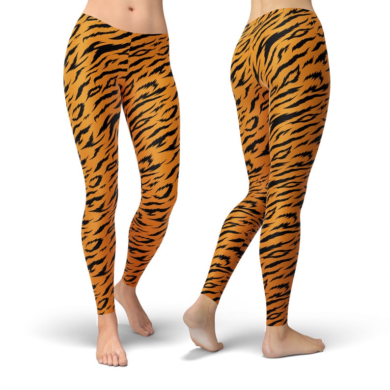 May include: Orange and black leggings with a tiger stripe pattern.