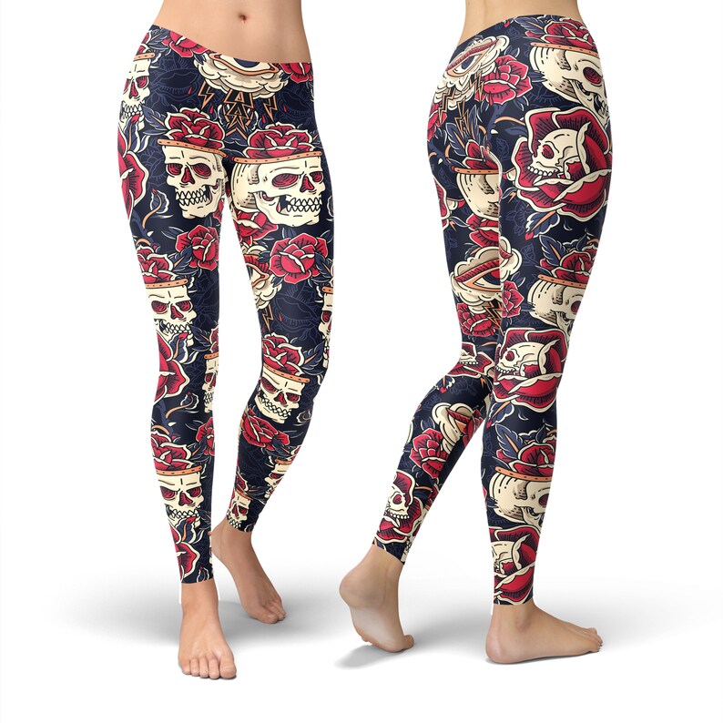 May include: Black leggings with a colorful pattern of skulls, roses, and other tattoo-style imagery.