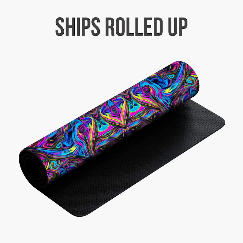 May include: A rolled-up yoga mat with a colorful abstract design featuring swirls of pink, blue, yellow, and green. The mat has a black underside.