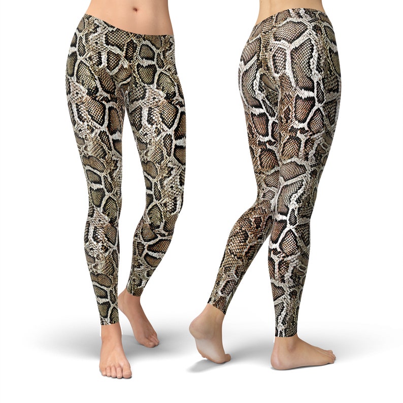 May include: A pair of brown and beige leggings with a snake skin pattern.
