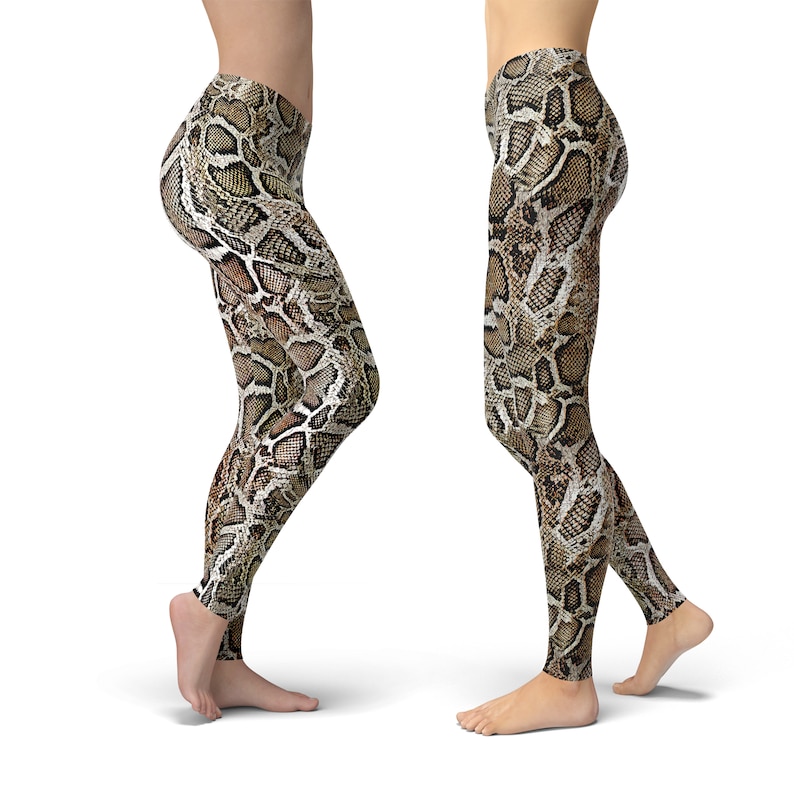 May include: A pair of brown and tan leggings with a snake skin pattern.