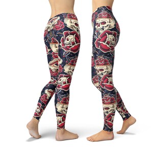 May include: A pair of black leggings with a skull and rose print. The leggings feature a repeating pattern of red roses and white skulls.