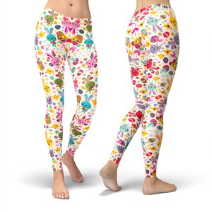 May include: White leggings with a colourful pattern of Easter bunnies, eggs, chicks, and flowers.