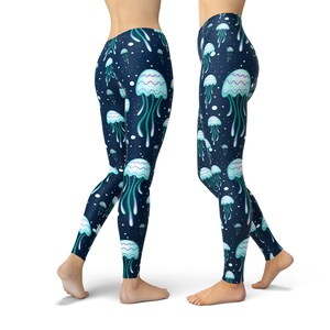 May include: Blue leggings with a pattern of white jellyfish with blue tentacles on a dark blue background.
