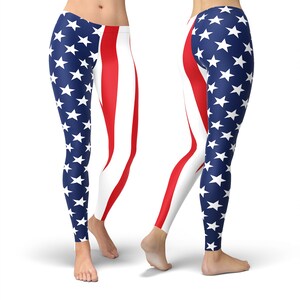 May include: A pair of leggings with a red, white, and blue American flag design. One leg features red and white stripes, while the other leg features blue with white stars.