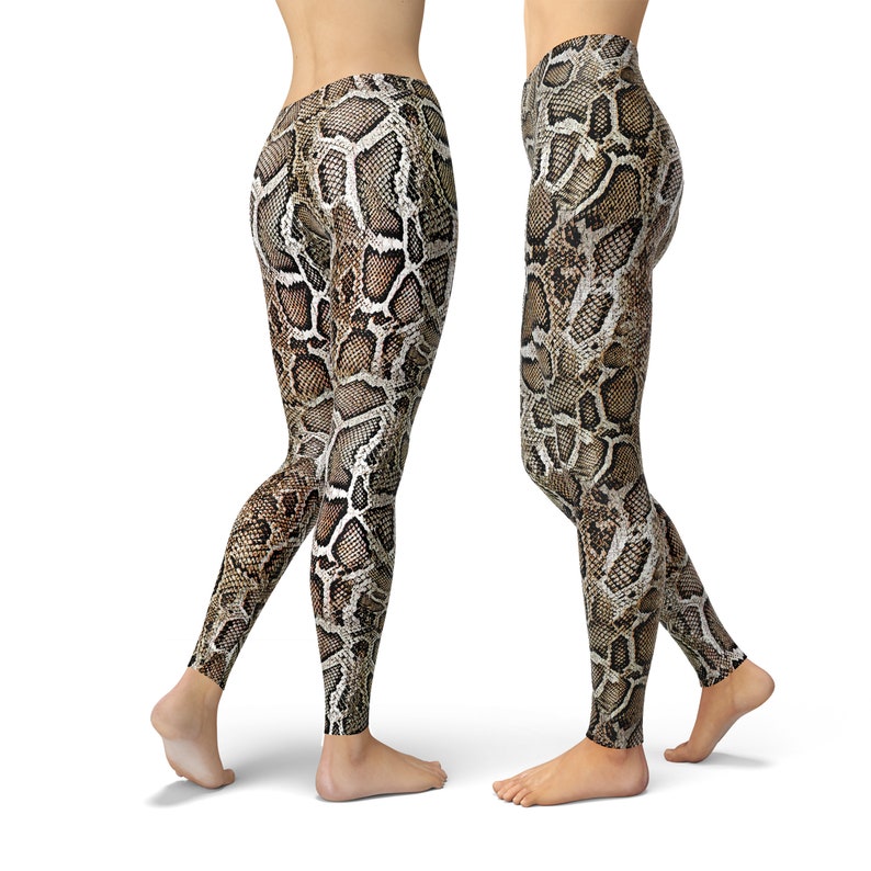 May include: A pair of brown and black leggings with a snake skin pattern.