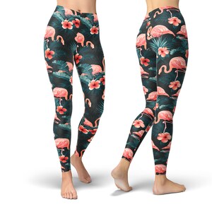 May include: Black leggings with a pink flamingo and tropical flower print.