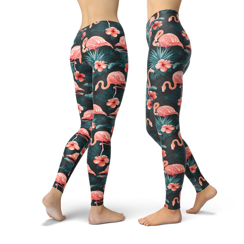 May include: Black leggings with a pink flamingo and tropical leaf print.