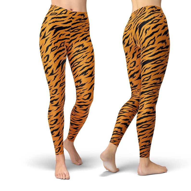 May include: Orange and black leggings with a tiger stripe pattern.