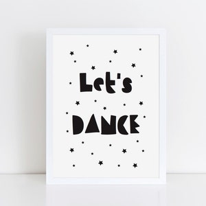May include: Black and white printable wall art featuring the text "Let's Dance" in a bold, playful font. The design is surrounded by small white stars on a white background.