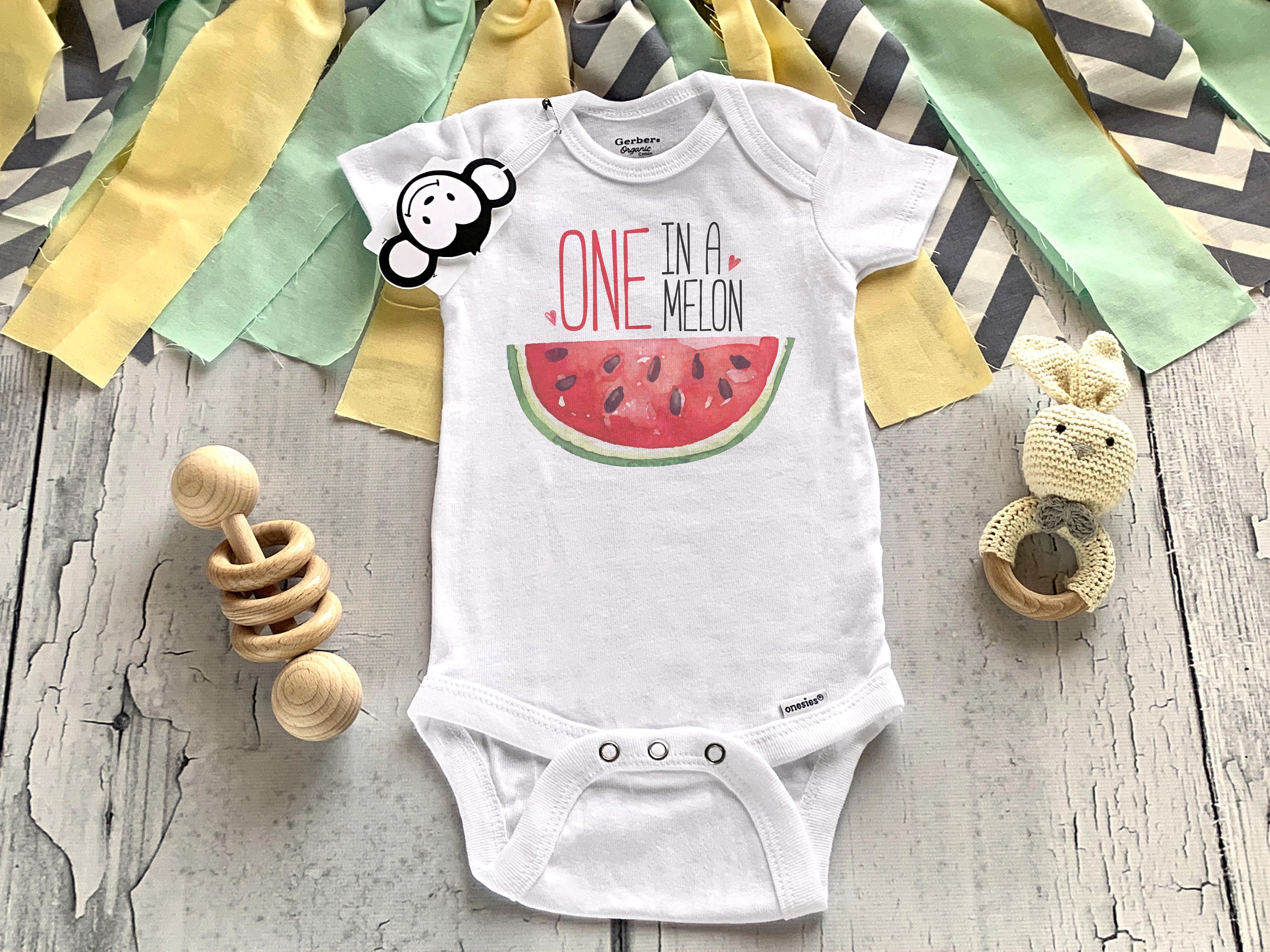 one in a melon first birthday outfit