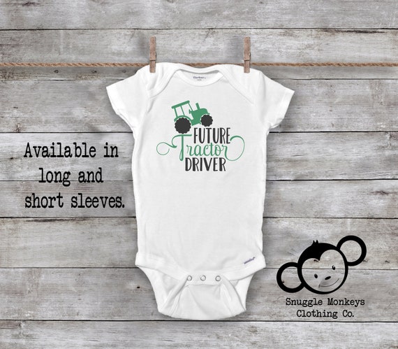 baby clothes with tractors on them