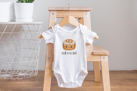 Funny Cinnamon Roll Baby Onesie: "Roll Model" Food Theme Bodysuit