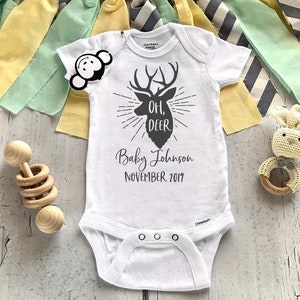 baby reveal onesie