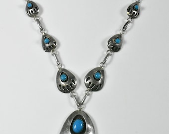Collar de turquesa y plata de ley con huella de oso