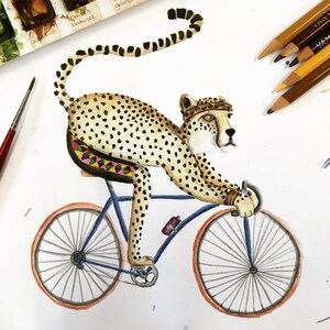 A6 Notepad-Cheeta on road bike image 4