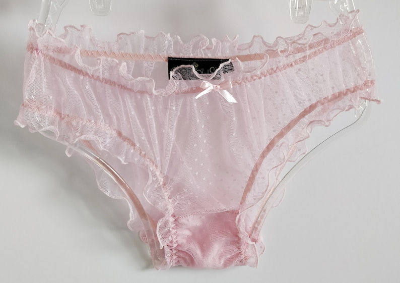 Trying on transparent panties. Trying on transparent panties