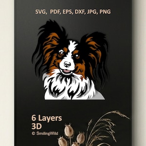 May include: A digital graphic of a Papillon dog featuring black, brown, and white fur. The text reads SVG, PDF, EPS, DXF, JPG, PNG, 6 Layers 3D, and SmilingWild. The design displays a layered, multi-dimensional appearance of the dog's head.