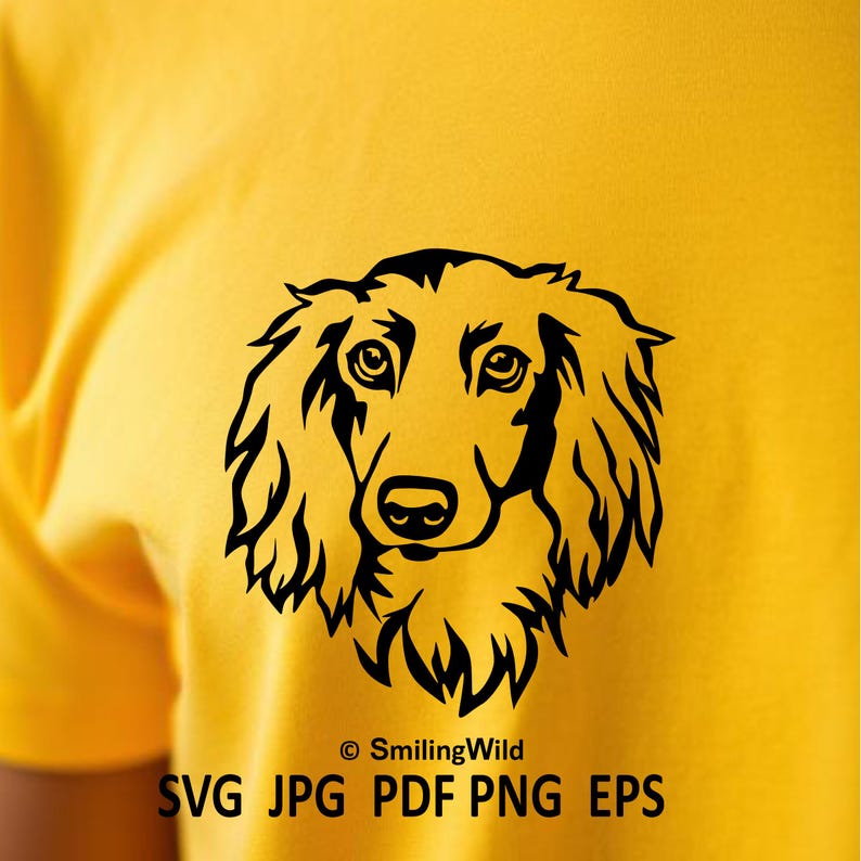 May include: A bright yellow t-shirt featuring a black graphic illustration of a long-haired dog's face. Below the dog, the text reads "&copy; SmilingWild SVG JPG PDF PNG EPS" in black, sans-serif lettering, centred on the fabric.