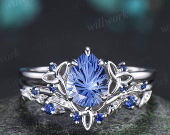 Pear fireworks cut cornflower blue sapphire celtic knot unique engagement ring leaf vintage bridal wedding ring set blue gemstone silver