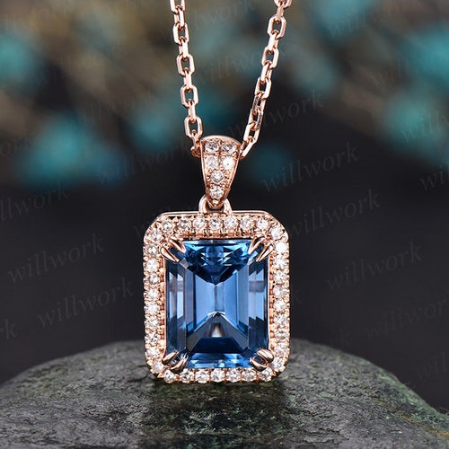 ALARRI 1.15 CTW 14K Solid Rose Gold Proud Heart Blue Topaz Necklace with 20 Inch Chain Length 