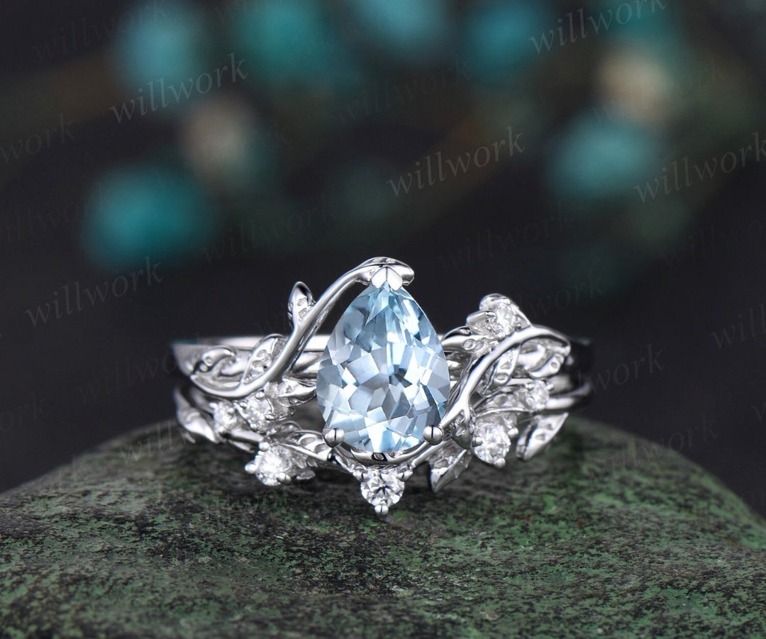 Pear Cut Aquamarine Dress Ring with a Diamond Pave Twisted Shank main image 1