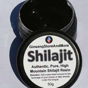 May include: A black jar with a white label that reads "GinsengStoreAndMore Shilajit Authentic, Pure, High Mountain Shilajit Resin". The label also includes directions for use and a 50g weight.