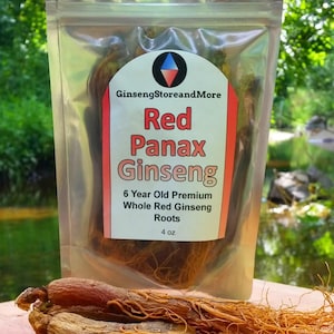 May include: A clear plastic bag filled with dried red ginseng roots. The bag has a label that reads "GinsengStoreandMore" and "Red Panax Ginseng". The label also states "6 Year Old Premium Whole Red Ginseng Roots" and "4 oz".  A few of the ginseng roots are visible outside of the bag.