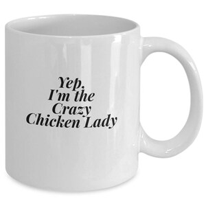 May include: White ceramic coffee mug with black text that reads "Yep, I'm the Crazy Chicken Lady".