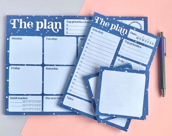 May include: A set of blue and white planner pages with a starry night design. The pages include sections for daily scheduling, weekly planning, habit tracking, and notes. The text "The plan" is printed in a retro font.
