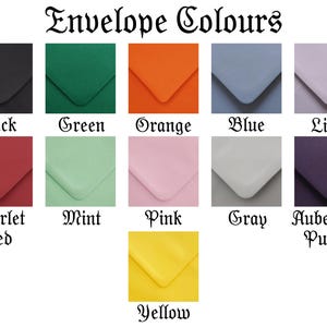 a collection of envelope colors, including black, green, orange, blue, lilies, red, mint, pink, gray, aubergine purple, and yellow.