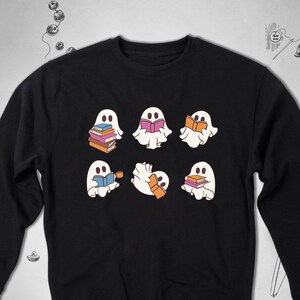 Halloween sweatshirt Trendy graphic design with cute ghosts books Reading Kawaii funny crewneck sweatshirt for reader gift idea