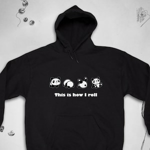May include: Black hooded sweatshirt with a white graphic of four pandas in different poses. The text "This is how I roll" is printed below the pandas.