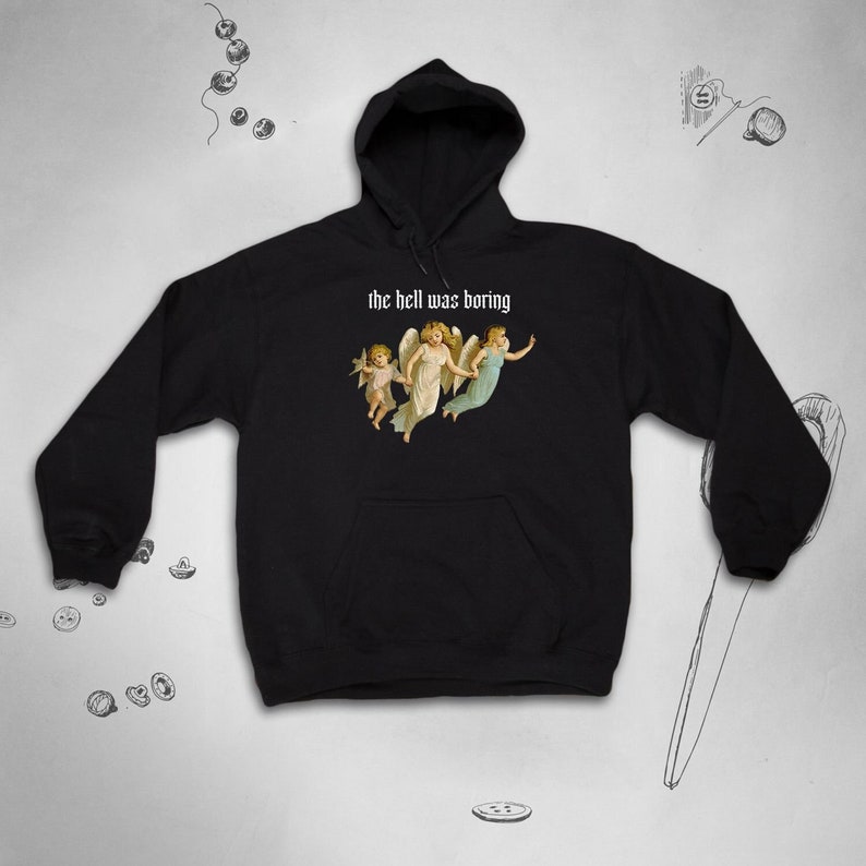 May include: Black hooded sweatshirt with a graphic of three angels and the text "the hell was boring" in white.