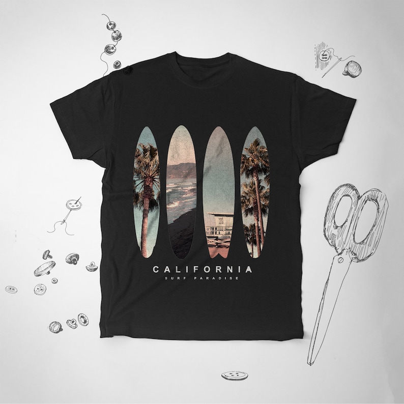 May include: Black t-shirt with a graphic of three surfboards with a beach scene and palm trees. The text "CALIFORNIA SURF PARADISE" is printed below the surfboards.
