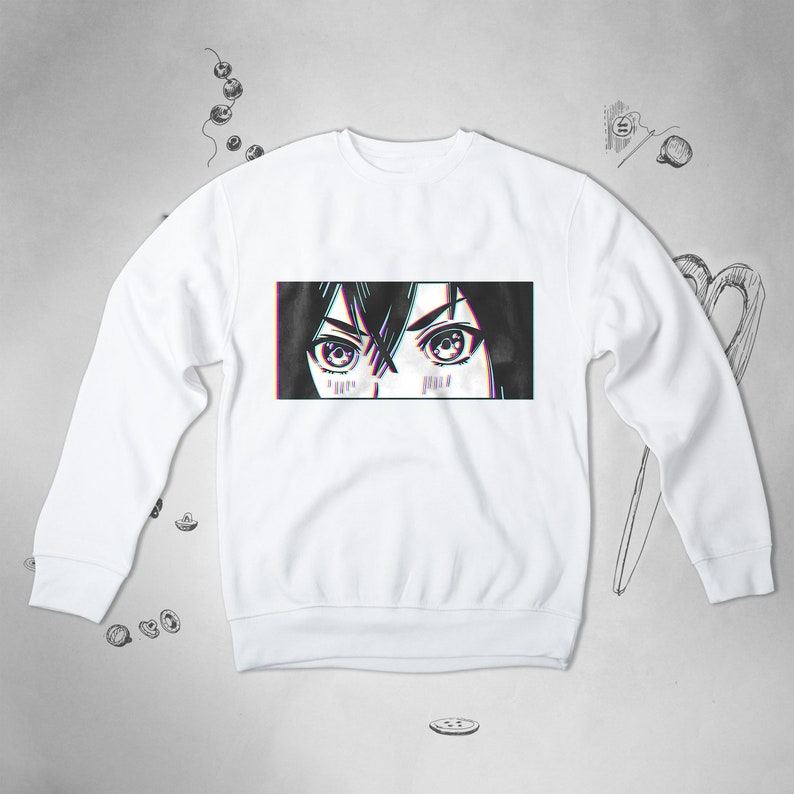 Pode incluir: Camisola branca com uma estampa gr&aacute;fica de olhos de mulher com um efeito de glitch.