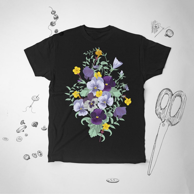 May include: Black t-shirt with a floral design featuring purple and yellow pansies on a green stem.
