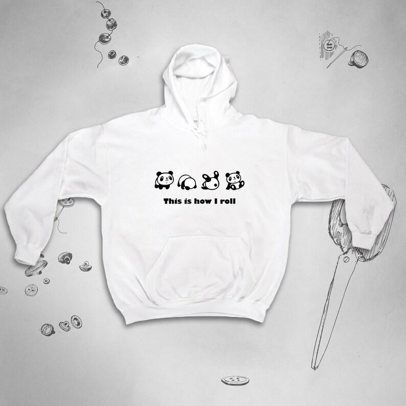 May include: White hooded sweatshirt with a black graphic of four pandas rolling, with the text "This is how I roll".