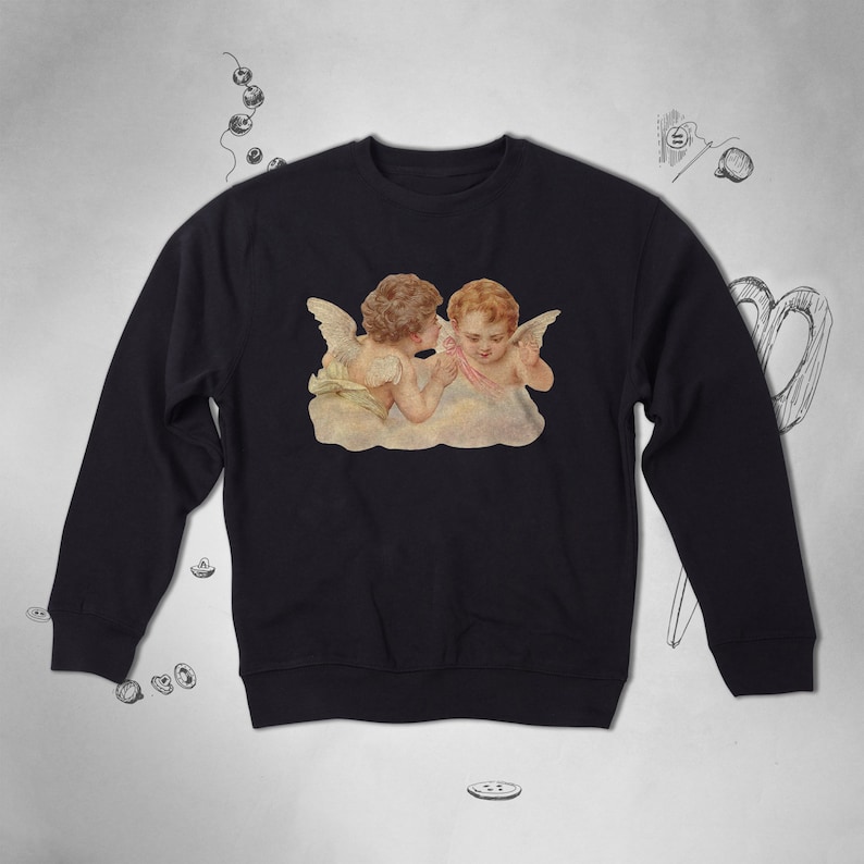 May include: Black sweatshirt with a vintage illustration of two cherubs with wings, one whispering to the other.