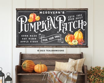 May include: A rustic wooden bench with pumpkins, pillows, and a plaid throw. Above, a chalkboard sign reads "McGovern's Pumpkin Patch" with watercolor pumpkins. The sign also lists activities like corn mazes and hay rides.