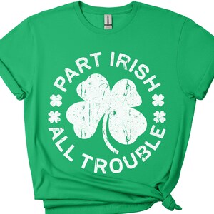 May include: Green t-shirt with a white shamrock and the text "Part Irish All Trouble" in a circle.