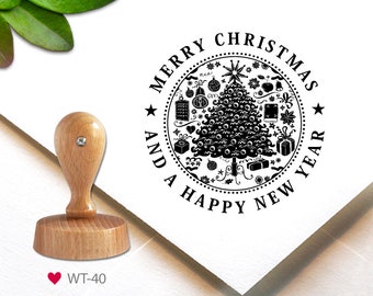 May include: A wooden stamp with a Christmas tree design and the text "MERRY CHRISTMAS AND A HAPPY NEW YEAR" in a circular pattern. The stamp has a wooden handle and base, with the product code "WT-40" visible.