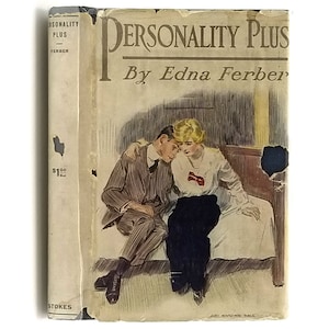 May include: A vintage book cover featuring a couple sitting on a bed. The book title is "Personality Plus" by Edna Ferber. The cover art is in black and white with a sepia tone.