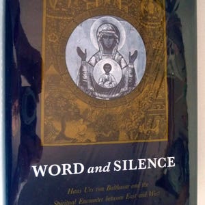 May include: A book titled "WORD and SILENCE" with a religious icon on the cover. The cover features a central image of a figure with a halo, surrounded by a gold-toned border. The author's name is Raymond Gawronski, S.J.
